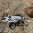 Известную на всю Россию архангельскую дорожную яму ремонтируют с помощью робота